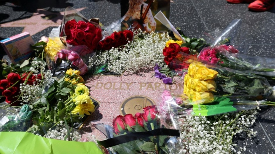 A replacement star honoring Dolly Parton is being installed on the Hollywood Walk of Fame after the original was vandalized