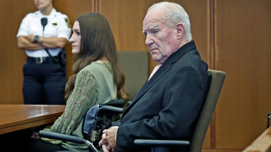 Lindsay Clancy, pictured here in court with her lawyer, Kevin Reddington, was on trial for the murder of her three young children