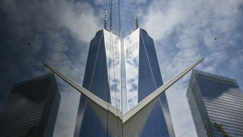 A new skyscraper, One World Trade Center, rises from the New York location of the Twin Towers that were destroyed in the 9/11 attacks of 2001