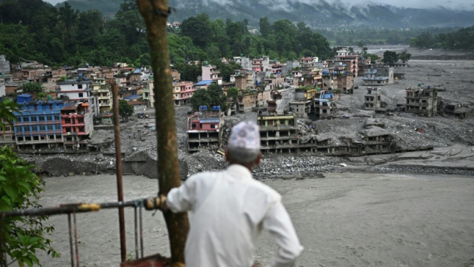 The August 26 glacial and mountain collapse on the China-Nepal border killed at least 1,398 people