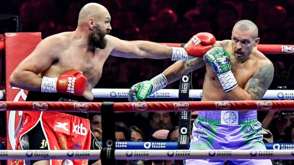 Tyson Fury (left) has challenged Oleksandr Usyk to a third fight