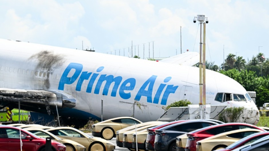 An Amazon cargo plane overran the runway at Miami airport on Sunday, killing five people