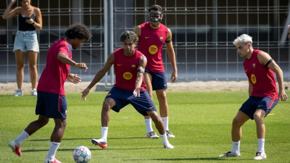 Barcelona winger Lamine Yamal said he would not beg for the Ballon d'Or but said he was very happy with winning La Liga and the World Cup