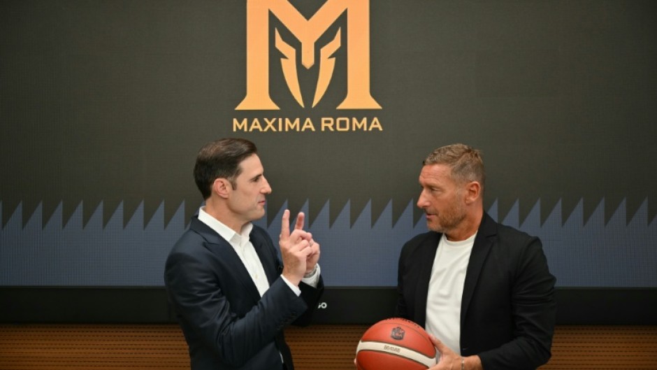 Maxima Roma president Paul Matiasic unveils his club's latest signing Francesco Totti