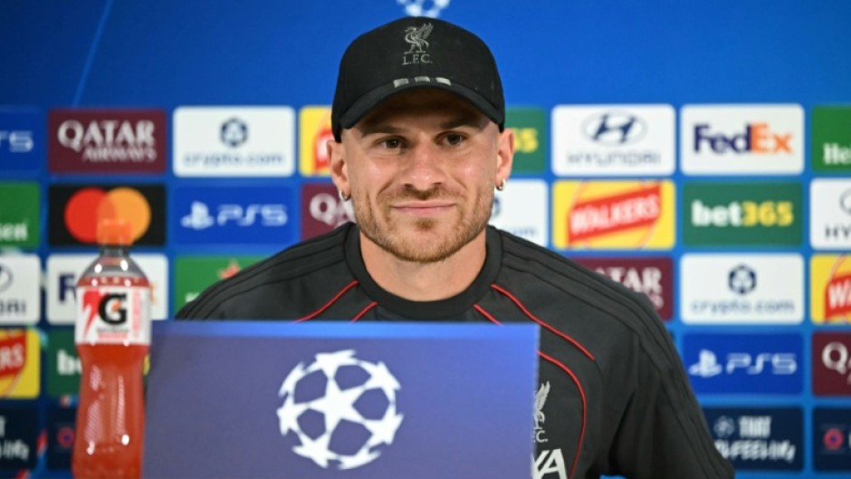 Liverpool midfielder Alexis Mac Allister attends a press conference on the eve of a Champions League first-round match at home to Atletico Madrid