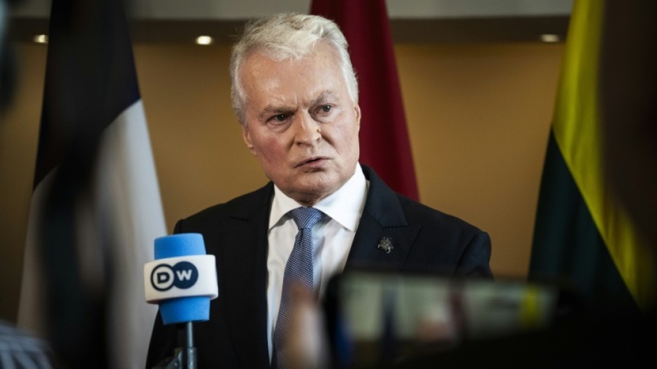 Lithuania's President Gitanas Nauseda speaks with journalists at the Arktikum science centre during The European Arctic Summit in Rovaniemi, Finland, on September 14, 2026