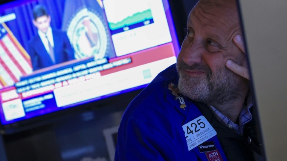 US stock markets, which had largely priced in Wednesday's rate hike, were down on the news, expected with any rate hike as equities become less attractive