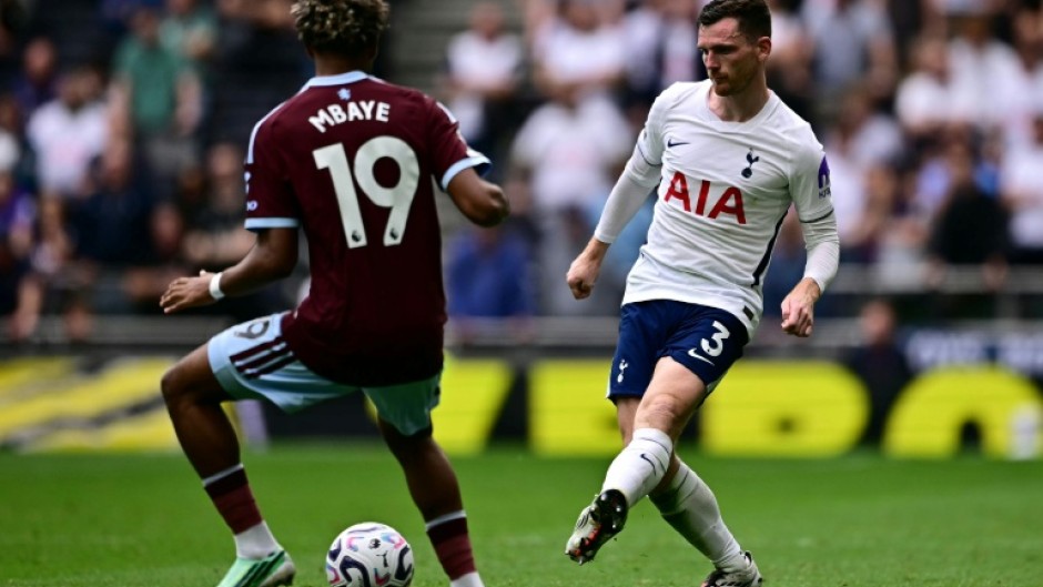 Tottenham full-back Andy Robertson (R)