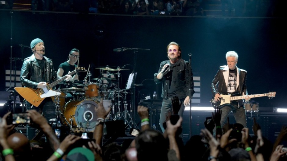 Irish rockers U2 - comprising Bono, The Edge, Adam Clayton and Larry Mullen Jr. - perform at The Forum in Inglewood, California in 2018