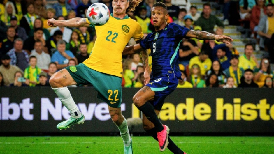 Brazil's Danilo Santos (R) and Australia's Jackson Irvine compete for the ball during the international friendly football match between Australia and Brazil at Suncorp Stadium in Brisbane on September 29, 2026.