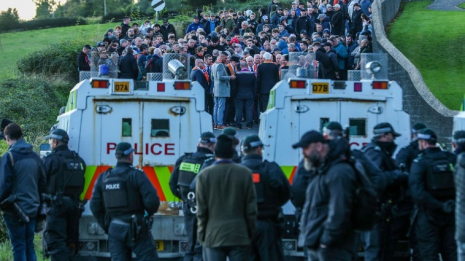 Portadown Orangemen and supporters gathered at a church after being stopped by police from marching to Garvaghy Road in Portadown, Northern Ireland