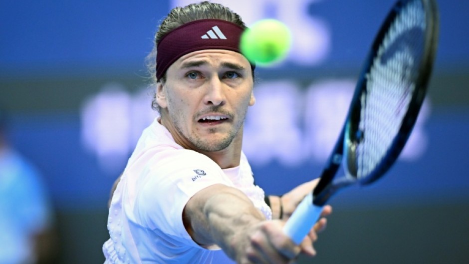 Germany's Alexander Zverev hits a return to Britain's Cameron Norrie during their men's singles first round tennis match at the China Open tennis tournament in Beijing on October 1, 2026.