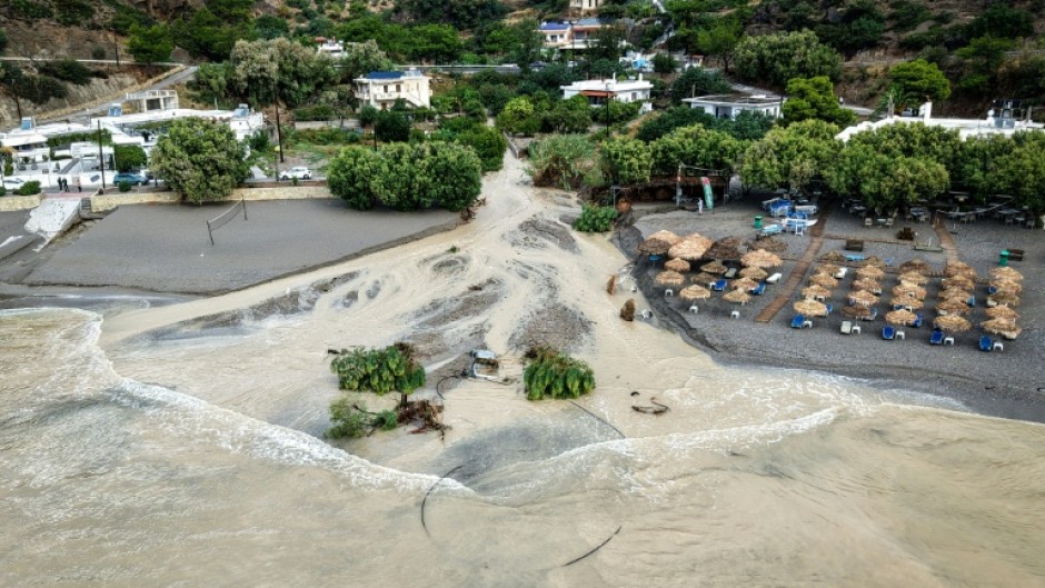 The heavy storms and floods washed away trees and vehicles