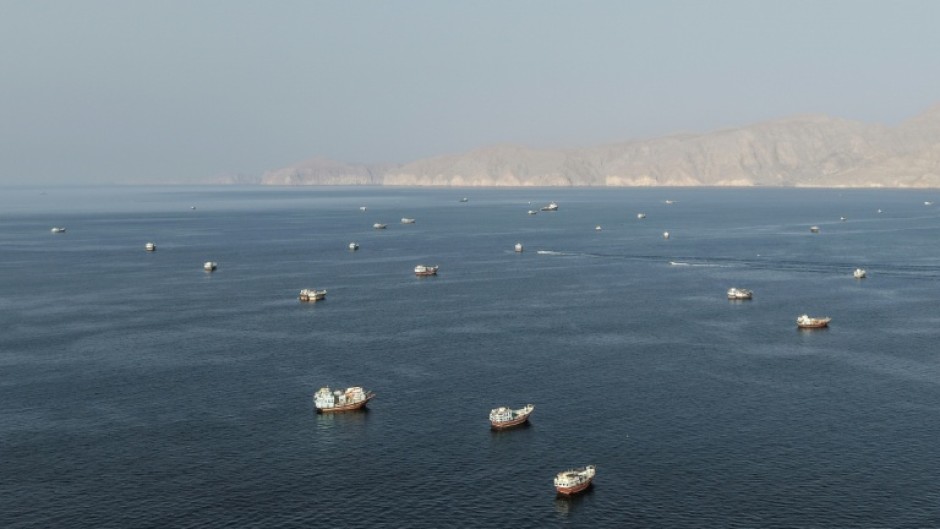 Ships anchored off the coast of Musandam governorate in Oman near the Strait of Hormuz on Friday