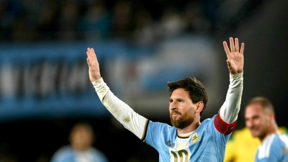 Lionel Messi celebrates scoring in his final international appearance for Argentina