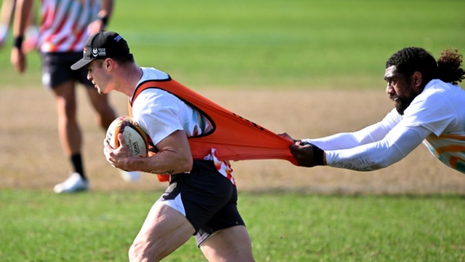 Rookie Issac Henry (L) has been called up by the Wallabies to face New Zealand
