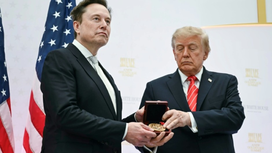 US President Donald Trump presents the National Medal of Science to Elon Musk
