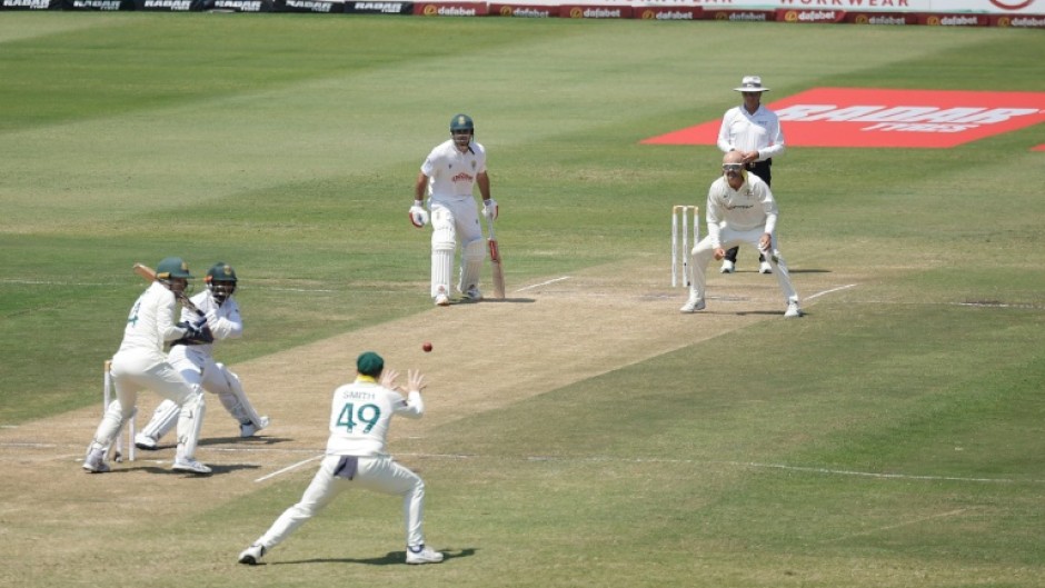 Australia's Steve Smith equalled the world record of 220 catches in Test cricket when he caught South Africa Temba Bavuma before going on to take three more and claim the record outright