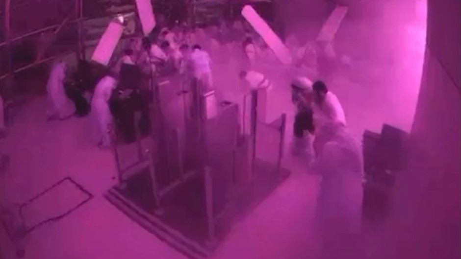 This screen grab taken from CCTV footage released by the Saudi media ministry shows the moment King Khalid International Airport was hit by a strike