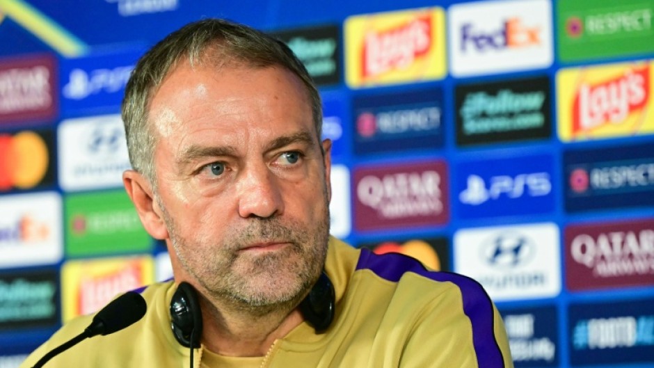 Barcelona's German coach Hansi Flick speaks during a press conference at Rams Park Stadium in Istanbul
