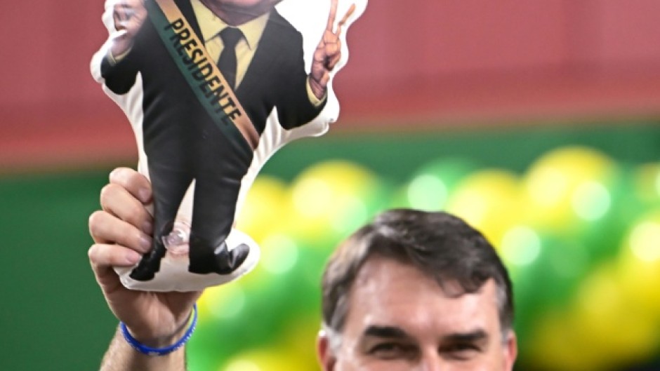 Flavio Bolsonaro, son of jailed ex-leader Jair Bolsonaro, is the favorite to win Brazil’s presidential runoff