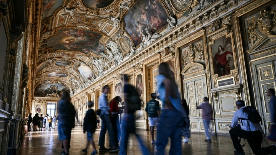 Visitors at the reopening to the public of the Apollo Gallery, where French crown jewels worth 88 million euros were stolen in 2025