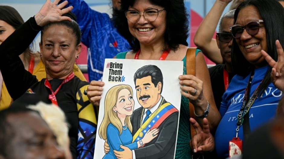 Backers of Nicolas Maduro have rallied in Venezuelan capital Caracas