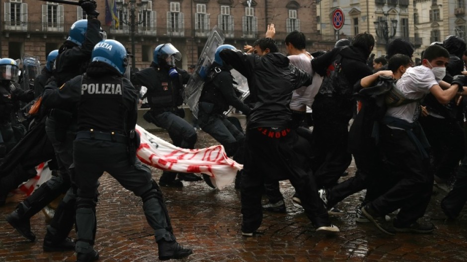 Police clashed with protesters in Turin on a national day of marches