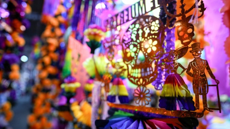 Skulls and skeletons wearing top hats are just some of the designs seen on colorful paper banners during Mexico's emblematic Day of the Dead festival in early November
