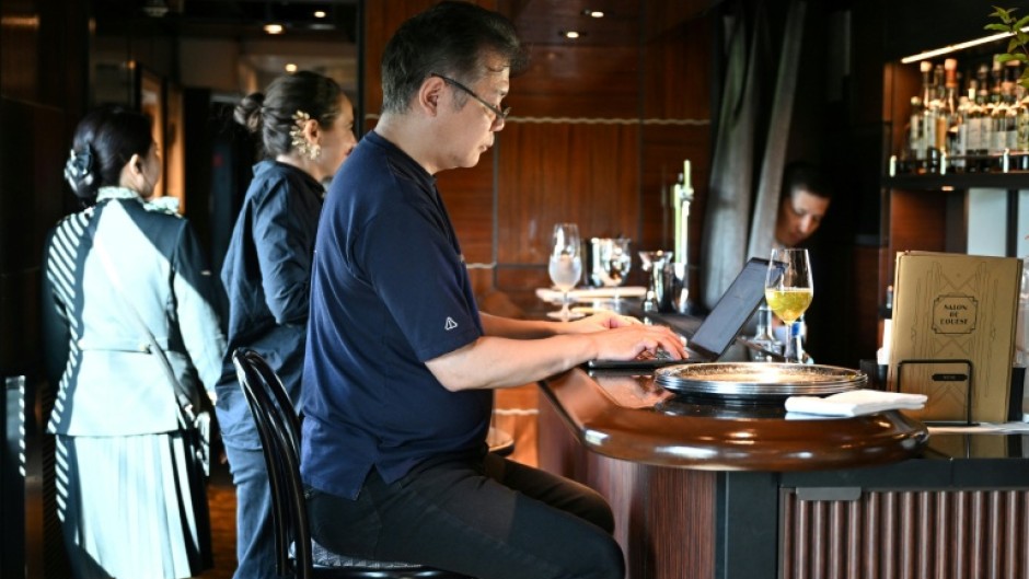 Toh EnJoe, a master of Japanese science-fiction, sipped a glass of wine as he wrote