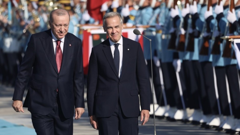 Canadian Prime Minister Mark Carney (right) and Turkey's President Recip Erdogan staged a joint news conference in Ankara