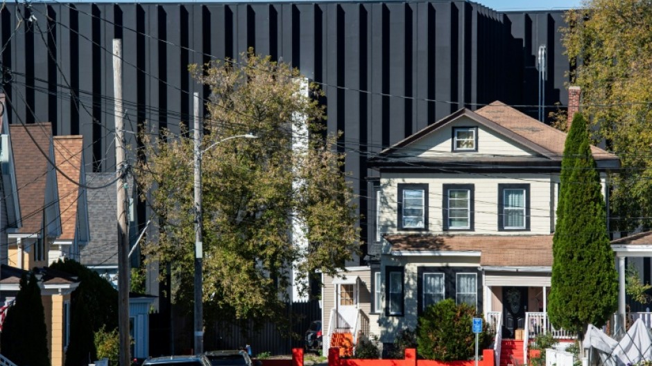 The Markley site, dubbed "the Dungeon" by some locals for the imposing black silhouette it presents in a residential neighborhood of this old milling city, encapsulates how data center fights are playing out nationwide