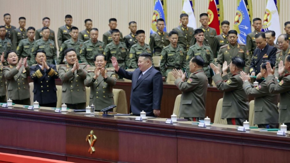 North Korean leader Kim Jong Un (C) attends a meeting of the Korean People's Army in Pyongyang.