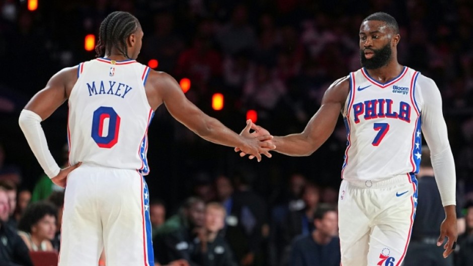 Tyrese Maxey celebrates with Philadelphia 76ers team-mate Jaylen Brown in their win over Milwaukee