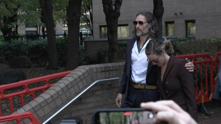 UK comedian Brand leaves court after giving evidence in rape trial