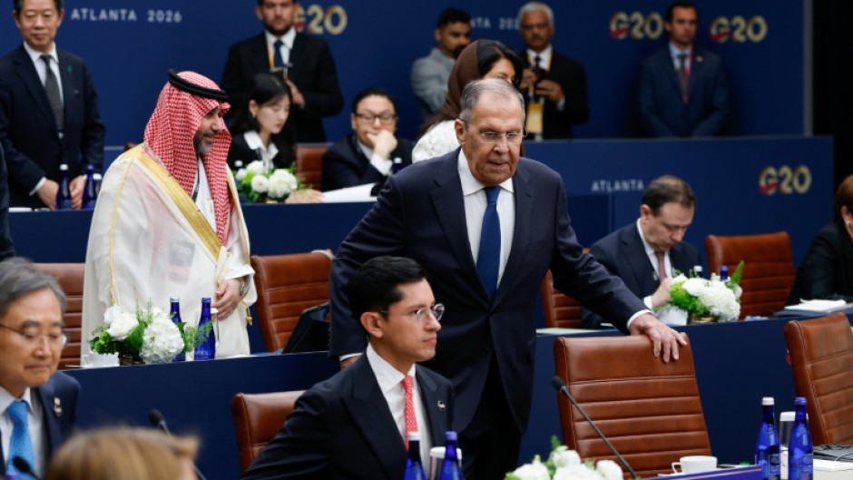 Russia's Foreign Minister Sergey Lavrov arrives to take his seat during the first plenary session at the G20 foreign ministers' meeting in Atlanta, Georgia