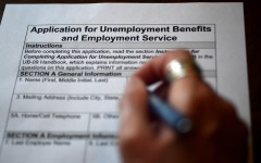 File: Half of all jobs at risk are in customer service and sales, food service and builder occupations.