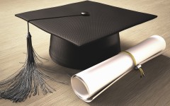Graduation certificate and mortar board.