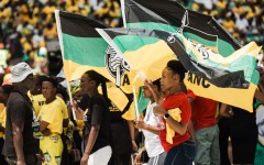 Supporters display ANC flags during the Election Manifesto launch. AFP/Rajesh Jantilal