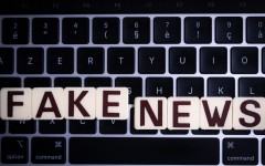File: This illustration photograph shows letters reading "fake news", against a laptop keyboard. AFP/Sebastien Bozon