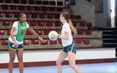 The netball players practicing.