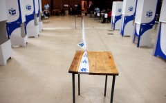 File: Tape of the IEC demarcates a polling station. AFP/Rodger Bosch