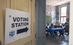 IEC officials wait for voters. AFP/Emmanuel Croset