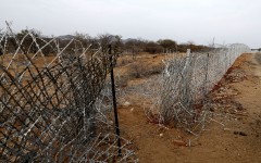 File: A vandalised border fence that separates South Africa and Zimbabwe where near the Beitbridge border post. AFP/Phill Magakoe