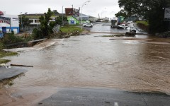 A general view of a flooded street following heavy rains in Pinetown. AFP/Phill Magakoe