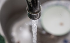 File: An open tap with water flowing from it. Romain Costaseca/Hans Lucas via AFP