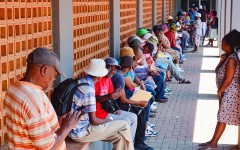 Shop owners queue to register their spaza shop businesses. Gallo Images/Fani Mahuntsi