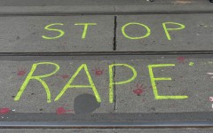''Stop rape'' is written on the road by protesters. Debarchan Chatterjee/NurPhoto via AFP