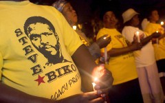 File: Members of SOPA hold a candlelight memorial to mark the death anniversary of the anti-apartheid activist Steve Biko. AFP/Rajesh Jantilal