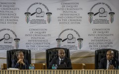 Justice Mbuyiseni Madlanga delivers his remarks during the judicial commission of inquiry probing Provincial Police Commissioner Nhlanhla Mkhwanazi's claims. AFP/Phill Magakoe